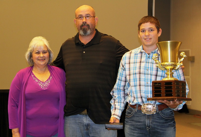 2014<br><br>Devon Wilson<br><br>Linda Hicks making the presentation, and John Price donated a belt buckle for Devon<br><br><a href='page.php?id=107'>Memorial to Pevine Hicks</a>