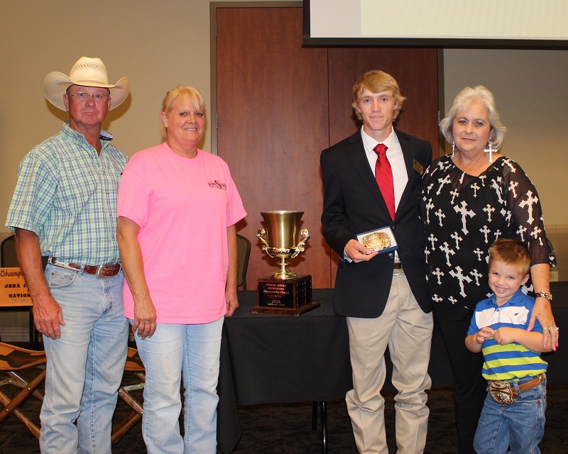 2015<br><br>Jarrett Mackie<br><br>Leonard and Darlene Graham donated the trophy.<br><br>Linda Hicks and grandson Wylie are in photo.<br><br>John Price will add Jarrett's name to the traveling trophy.<br><br><a href='page.php?id=107'>Memorial to Pevine Hicks</a>